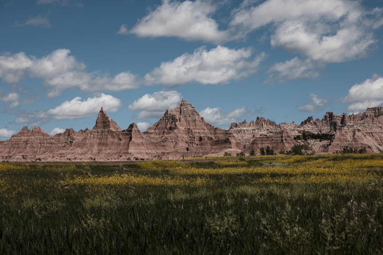 Badlands under a cloudy sky